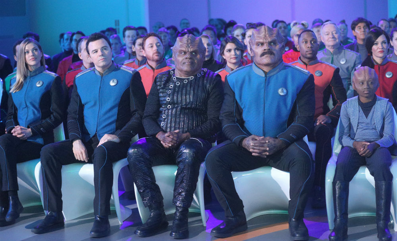Kelly, Ed, Klyden, a luxuriously mustachioed Bortus, and Topa.
